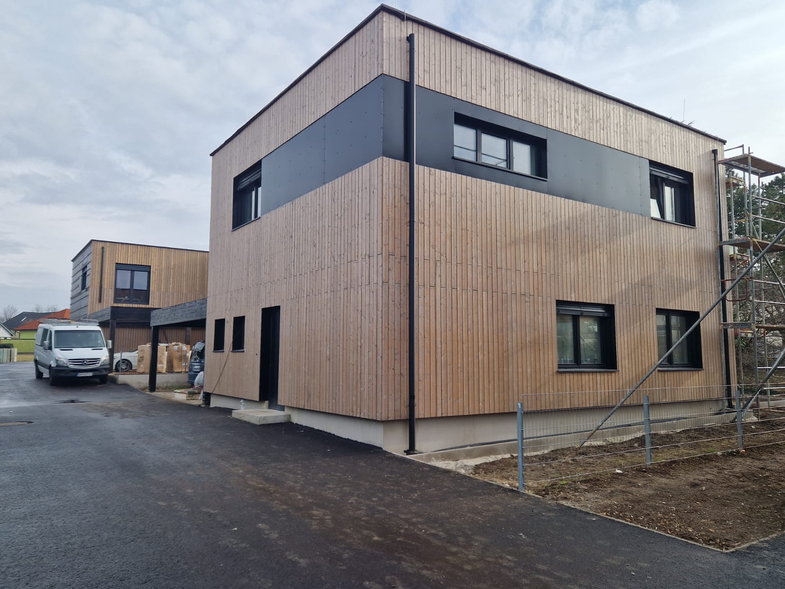 Completed single-family home built with Austrian timber frame construction — Eco Holz Residence